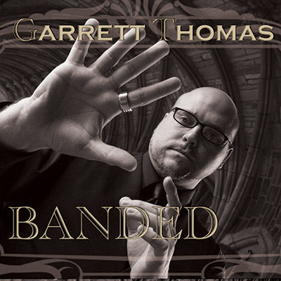 Banded 20 mm by Garrett Thomas and Kozmomagic